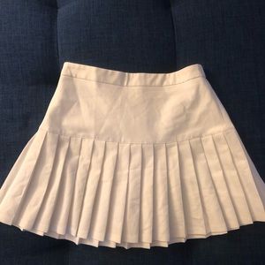 White pleated mini skirt